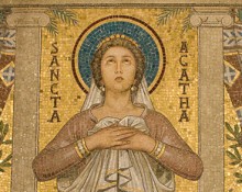 St. Agatha Mosaic from the crypt chapel of Santa Cecelia in Trastevere, Rome, Photo by Fr Lawrence Lew, O.P. via Flickr, Creative Commons. Attribution-NonCommercial-NoDerivs 2.0 Generic License.